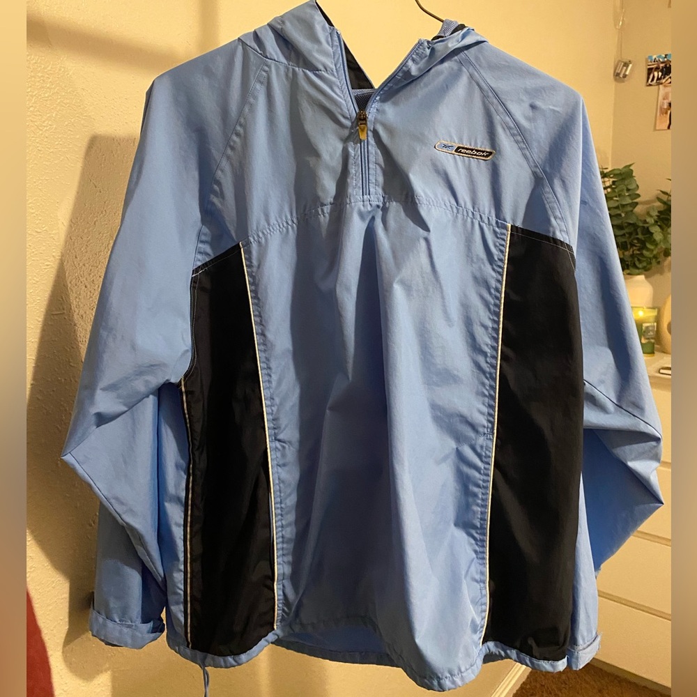 blue pullover windbreaker